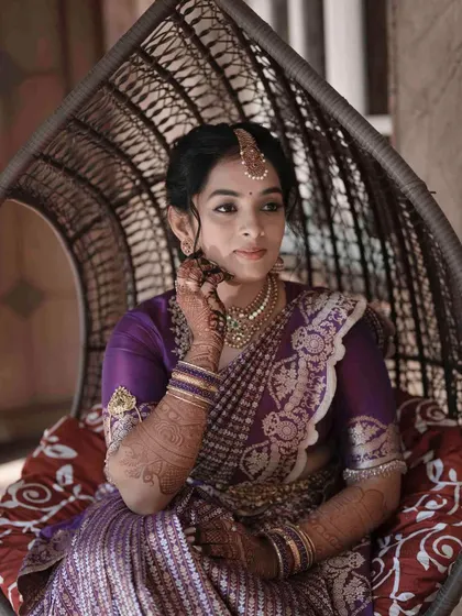 A serene portrait of a bride on her engagement day. The makeup is traditional, elegant, and subtle, perfect for a formal ceremony.