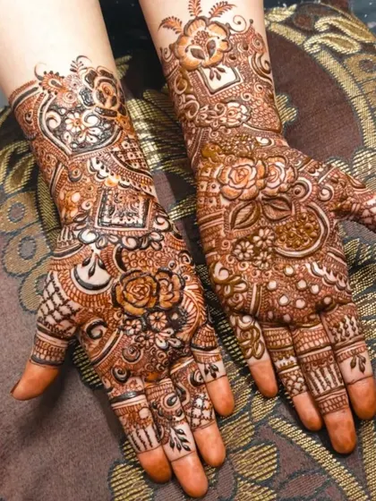 A beautiful half hands design with a mix of floral and geometric patterns. The intricate details make this a stunning choice for any occasion.