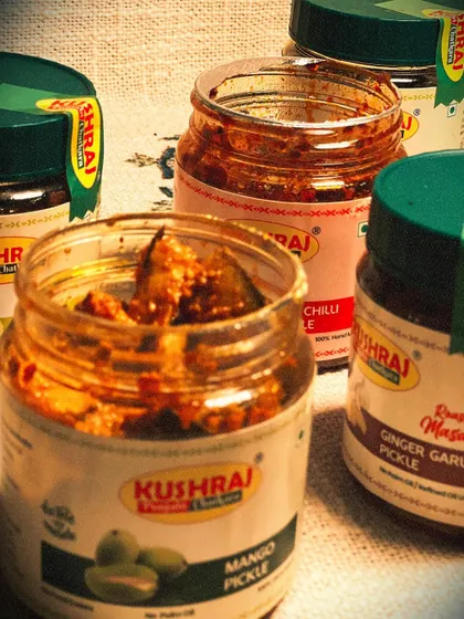 Another view of my pickle collection, focusing on the Mango Pickle with Ginger Garlic and Red Chilli jars nearby.