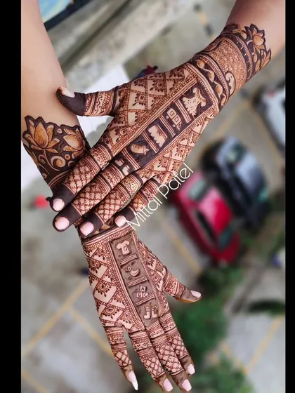 The back of the hands deserve just as much detail. This design complements a baby shower theme with a grid of charming motifs like baby clothes, rattles, and elephants, framed by a beautiful lotus border.