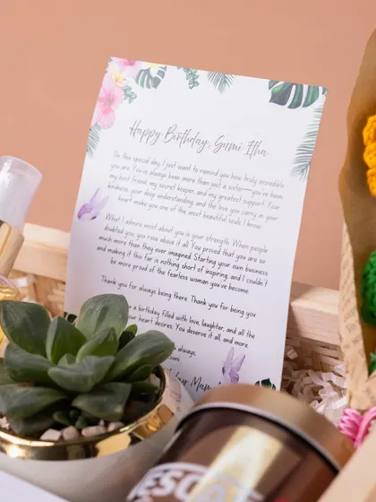 The personalized letter and succulent plant, two key elements that make my birthday hampers feel both personal and luxurious.
