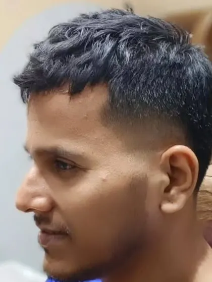 A textured crop cut for a male client, a popular and low-maintenance style.