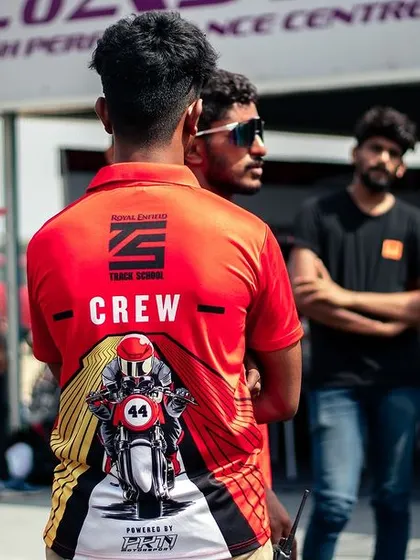 The back of our team's "CREW" t-shirts.