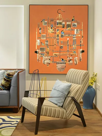 We turned the waiting lounge at L’artista by Mahindra Lifespaces into an experience. A bold, bright orange artwork captivates visitors, sparking conversation and creativity while they relax in a space designed to inspire.