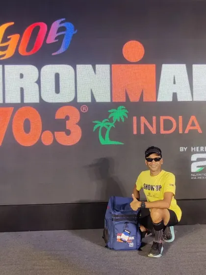 Pravin posing at the Ironman Goa event. The EDR family is incredibly proud of his grit and passion.