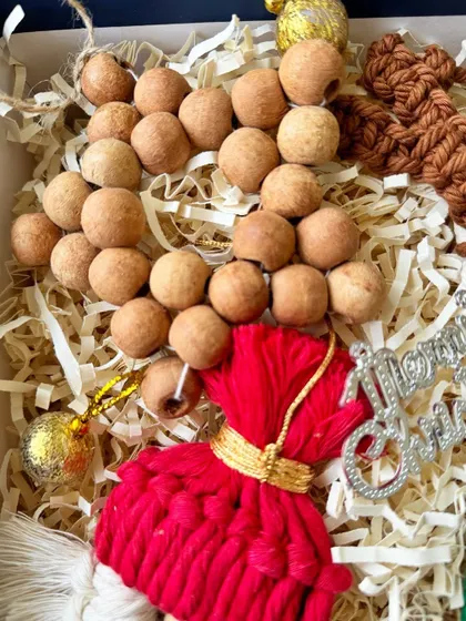 A detail shot of the wooden bead garland from my Christmas gift box.