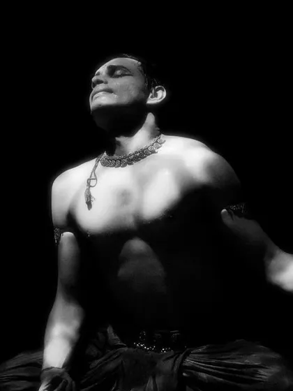 A black and white portrait of me during 'Naga Mandala'. The focused light and shadow create a sense of introspection and power.