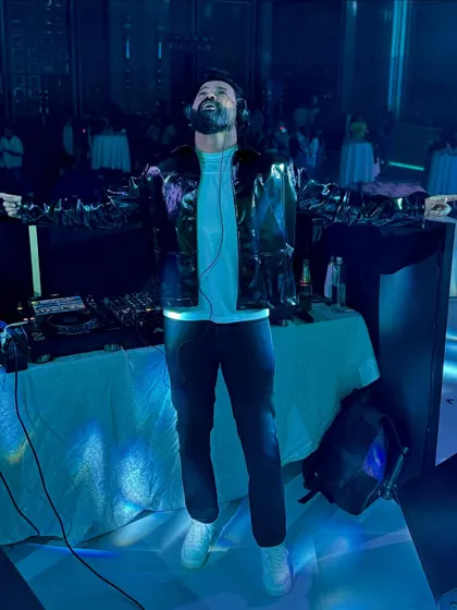 This is me in my element, completely lost in the music and the energy of the crowd. In these moments, when the beat, the lights, and the vibe all connect, I feel the most alive. It's more than just playing music; it's about creating a feeling.