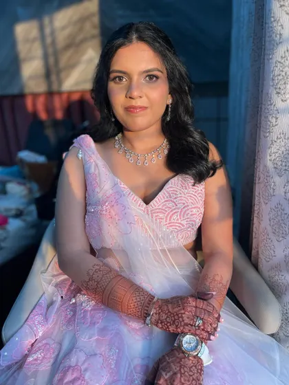 The final look is fresh, radiant, and perfect for a modern bride who loves soft, romantic colors.