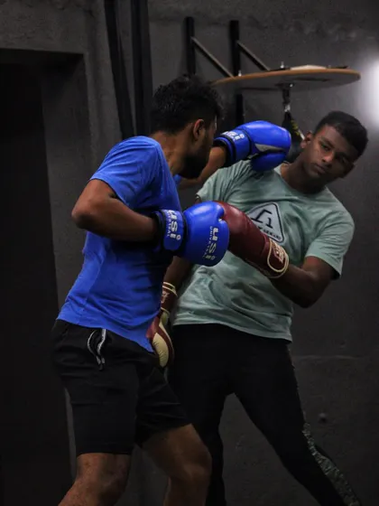 A fighter rolls with a punch, a defensive technique to reduce the impact. We teach both how to give and take a hit.