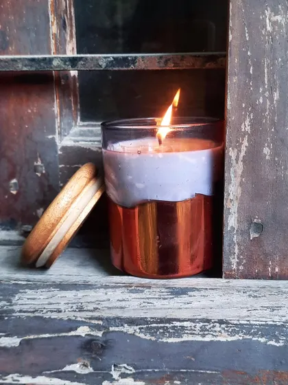 This rose gold bottom scented candle with a wooden lid is a luxurious option. I freshly make every candle to order, so you can customize the fragrance.