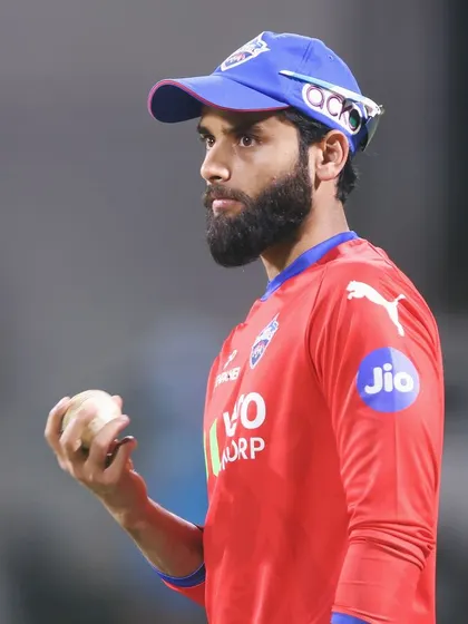 A portrait of a Delhi Capitals player, focused and determined. My job is to help athletes cultivate this mindset, knowing they have prepared to the best of their ability.