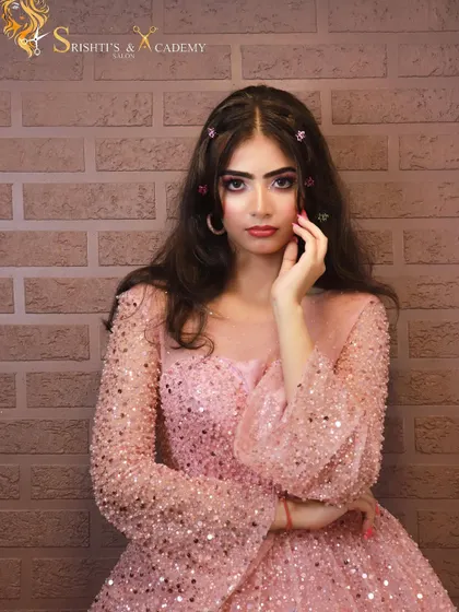 A full view of our Barbie-inspired look. The makeup, hair, and sparkling pink dress all come together to create a perfect real-life doll.