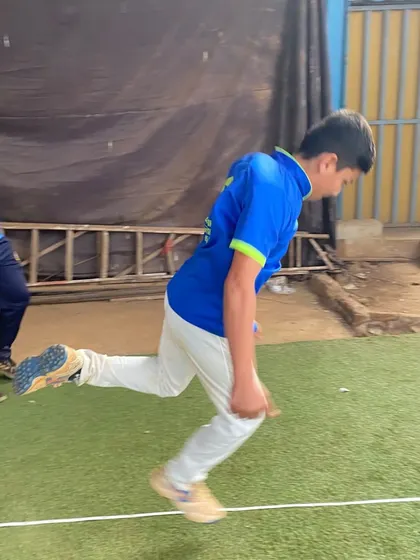 A player practices agility jumps during a training session. This type of plyometric exercise is key for developing explosive power and speed.