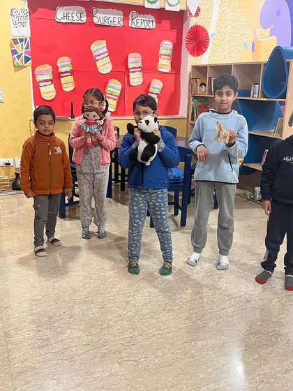 The kids and their cuddly friends, all ready for the pajama party. It’s a fun, relaxed event that helps children feel comfortable and make friends.