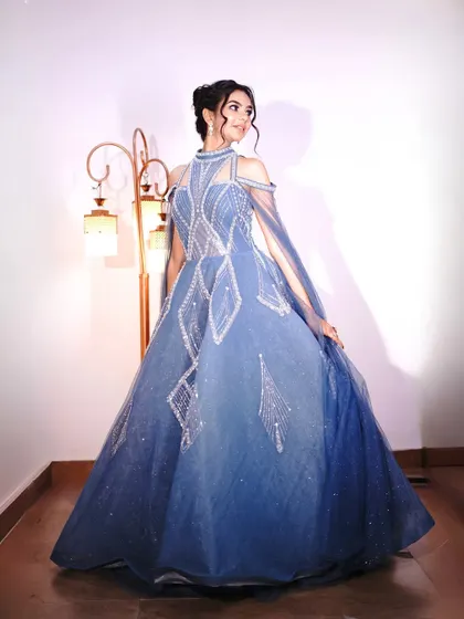 This blue gown gives a true princess feel, perfect for a themed pre-wedding shoot or a grand reception.