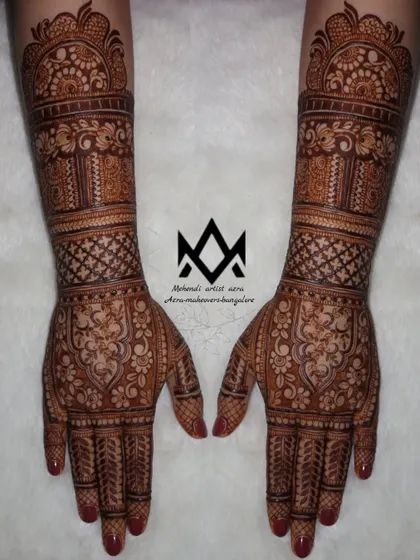 A full view of a classic bridal mehendi with architectural and geometric patterns.