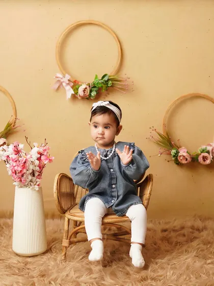 This little lady looks like she's about to give a speech! Milestone sessions are perfect for capturing these funny and expressive moments.