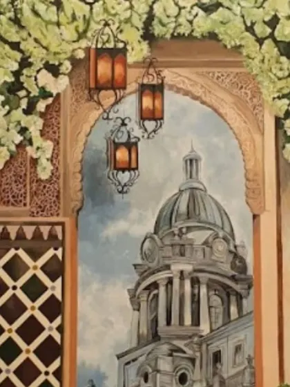 A close-up of the Spanish mural, focusing on the painted archway that looks through to a domed building, with beautiful hanging lanterns.