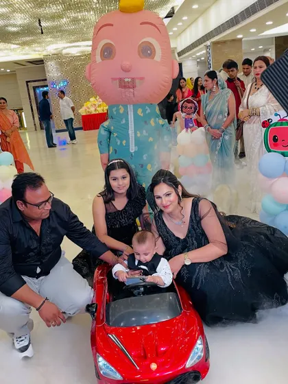 A fun moment from a Cocomelon themed party, featuring a giant inflatable Cocomelon character. We can arrange for special elements like this to make your child's party extra memorable.