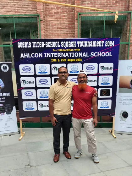 A picture with a fellow coach at the inter-school tournament. Our network of coaches across the NCR is one of our greatest strengths.
