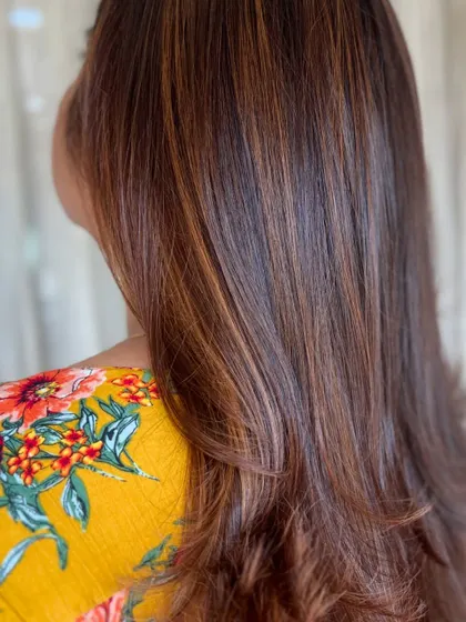 A close-up of the caramel highlights, showing the detail and precision of the color application.