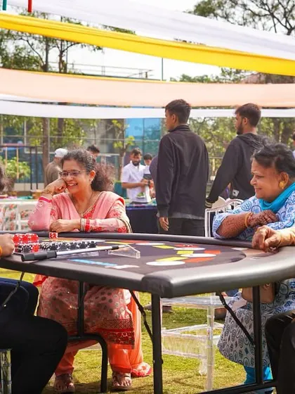 A casino-themed party is a great way to entertain guests. Here, family members are enjoying a game of poker at one of the tables I set up for the event.