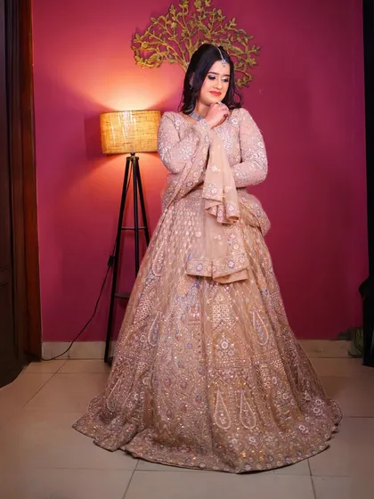 A full-length shot of the pastel peplum lehenga, a unique and stylish option.