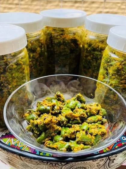 My homemade Green Chilli Pickle is for those who need an instant kick of heat with their food. I use fresh green chilies and a simple yet flavorful mix of mustard and other spices.