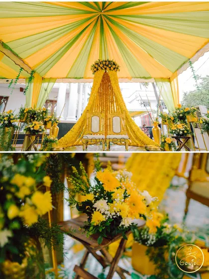 A bright and sunny Haldi setup with a canopy of yellow and green drapes and marigold flowers.