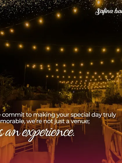 We commit to making your special day memorable from day to night. This evening shot shows the venue lit up with string lights.