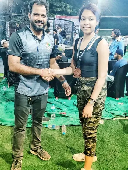 My student Anwesha Saren receiving congratulations after her bronze medal win in the MMA National Tournament. I am incredibly proud of her performance and courage.