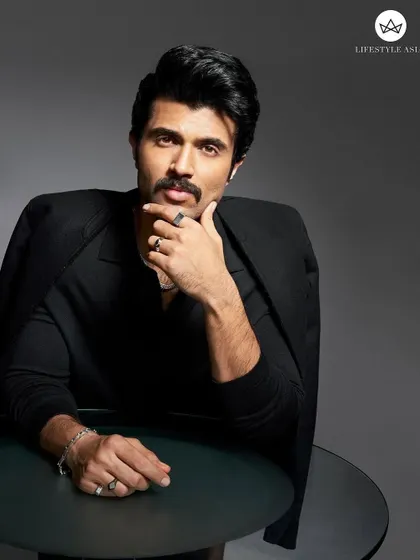 A full look from the Lifestyle Asia shoot with Vijay Deverakonda. Draping the Zegna blazer over the shoulders adds a touch of effortless cool to this otherwise formal, all-black ensemble.