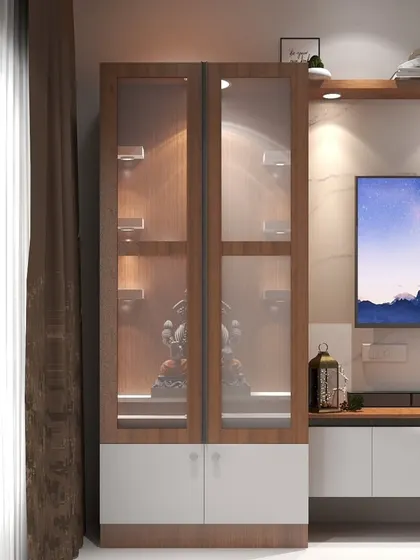 A close-up of a puja unit with glass doors, designed to be a serene and beautiful part of the living room's entertainment console.