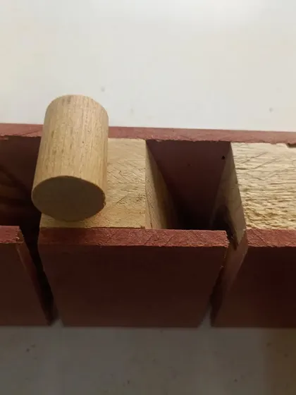 A saw till I made to organize my hand saws and other long tools. The dowels and dividers keep everything separated and easy to grab.