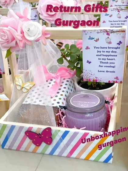 This colorful return gift basket is perfect for a child's birthday party, featuring a striped design and butterfly accents.