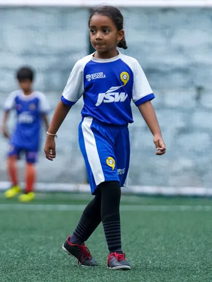 A young girl participates in the Sporthood trials, demonstrating our commitment to providing opportunities for all.