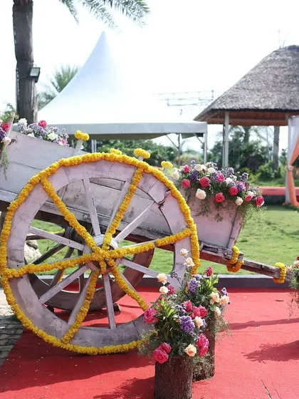 A slightly different angle of the decorative cart, showing how it can be positioned as a key feature in an outdoor event space.