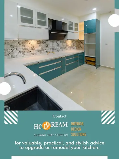 A bold and beautiful kitchen with teal blue cabinets and a patterned tile backsplash. The design is both stylish and practical, offering plenty of counter space and storage.