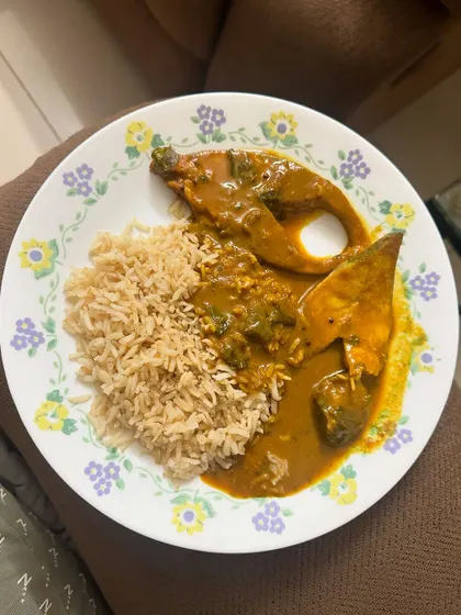 A repeat of the comforting dinner of brown rice and fish curry.