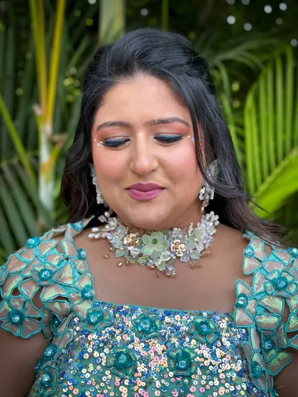 Another angle of the carnival makeup, showing the subtle details that make the look unique.