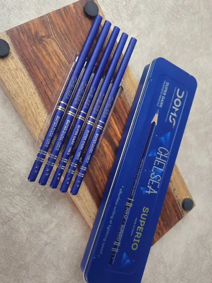 The complete personalized DOMS pencil set, including the custom tin box and engraved pencils.