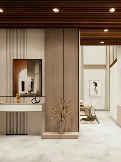 This foyer uses vertical wood and textured panels to create a sense of height. A minimalist white console table provides a surface for decor, defining the space with clean lines.