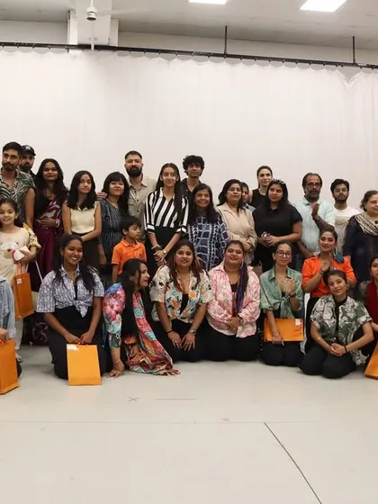 This is my tribe. A group photo with all the amazing students and their supportive families after our first showcase. The sense of community and shared joy is the best part of my job.