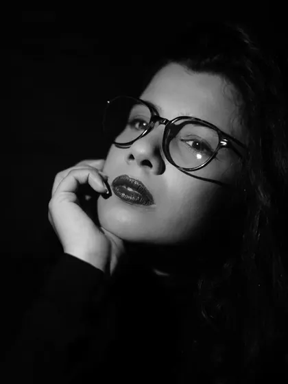 A final shot from the low-key series, with a direct and confident gaze. This demonstrates how a simple lighting setup can be used to create a variety of powerful portraits.
