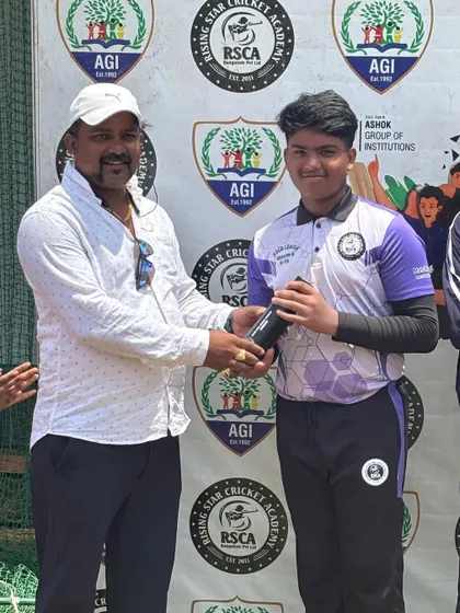 A player receives his award for a standout performance in the RSCA League Season 6.