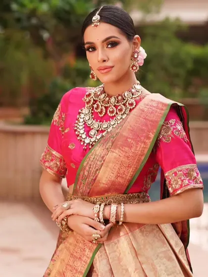 The final look is a beautiful fusion of tradition and modernity, showcasing the versatility of a classic Kanjeevaram saree.