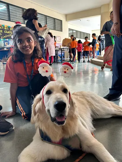 The dogs and I had a wonderful time at a school's winter carnival. Surrounded by kids and food, they were perfectly behaved, showing their potential as therapy dogs. I hope more schools open their doors to the benefits of having dogs around children.