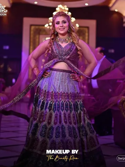 A repeat of the stunning reception look, showing how the makeup and outfit create a powerful impact in a grand setting.