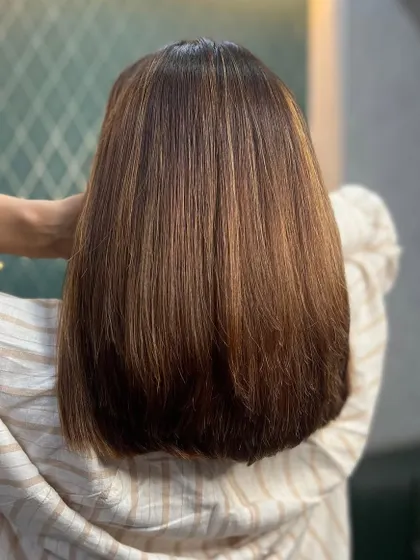 Rich Biscoff Magic. This sleek, straight bob is bold, elegant, and all about turning heads while feeling fabulous.
